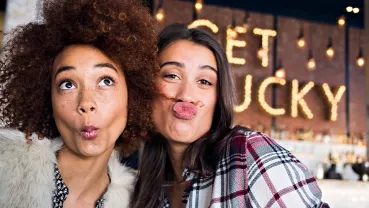 Two women doing funny faces